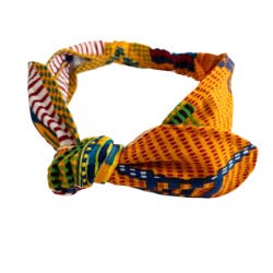 Bandeau nœud supérieur imprimé tissu Kente orange africain I The Enchanted Magnolia pour la vente par The Enchanted Magnolia