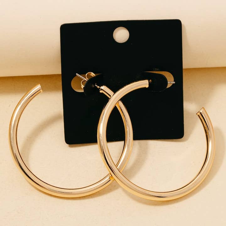 Gold Dipped Large Tube Hoop Earrings for wholesale on Faire