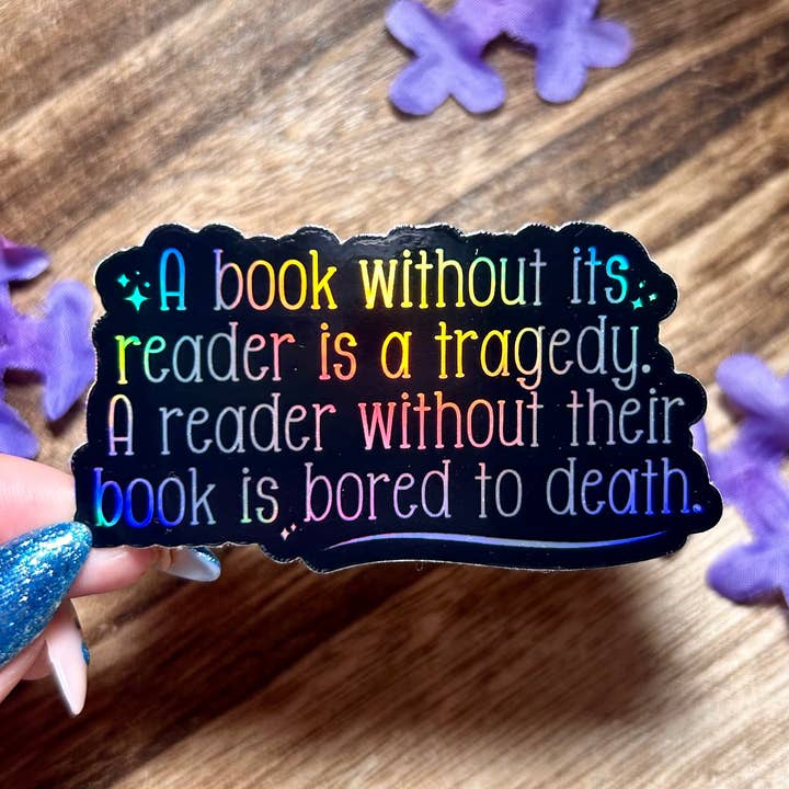 A Book Without a Reader is a Tragedy Holographic Sticker for wholesale by Awfullynerdy.co