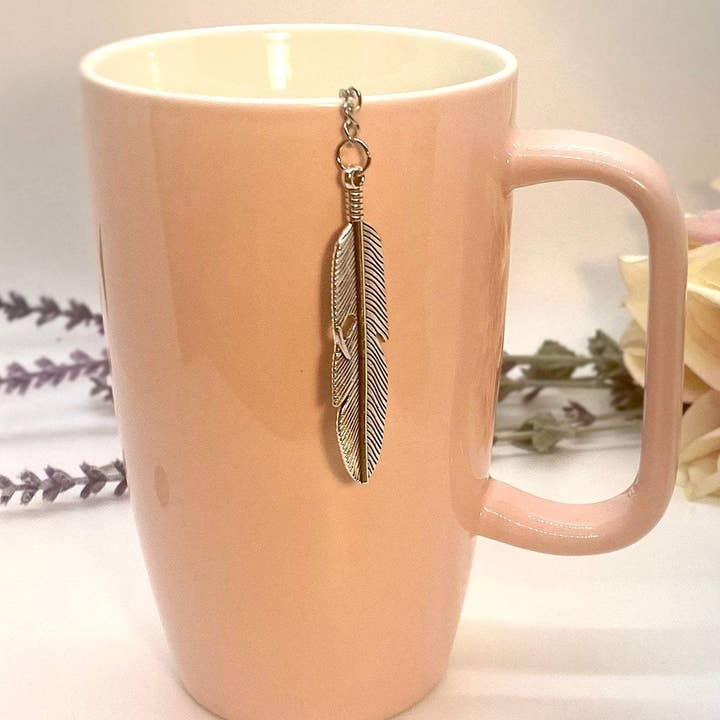 The Traveling Teapot – wholesale Tea strainer/infuser – Loose Leaf Tea Infuser, Feather Charm Ball, Tea Lover Gift
