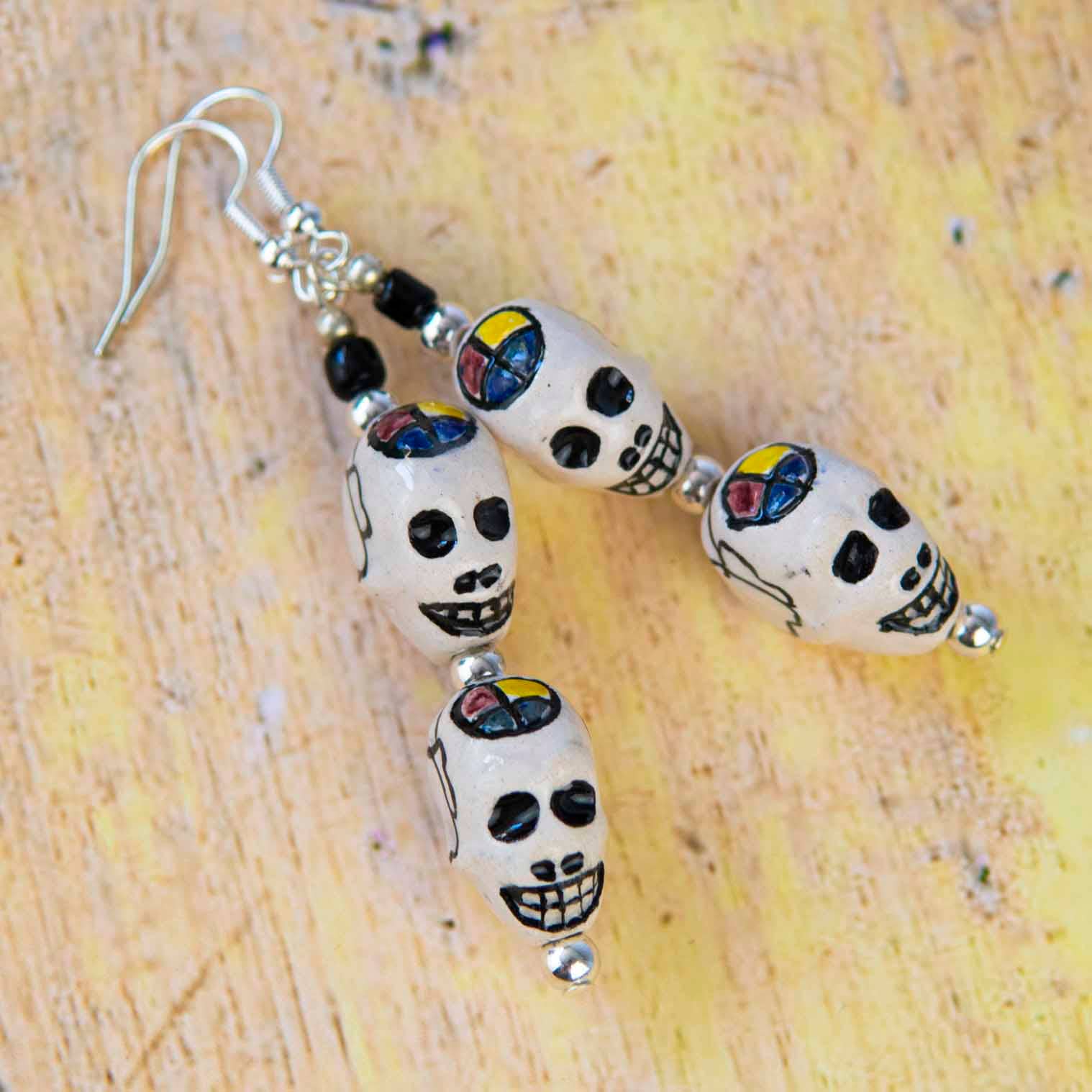 White Double Skull Earrings for wholesale on Faire1
