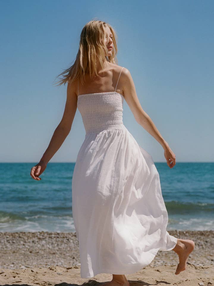 The Harlow Smocked Maxi Dress in white for wholesale by arkitaip