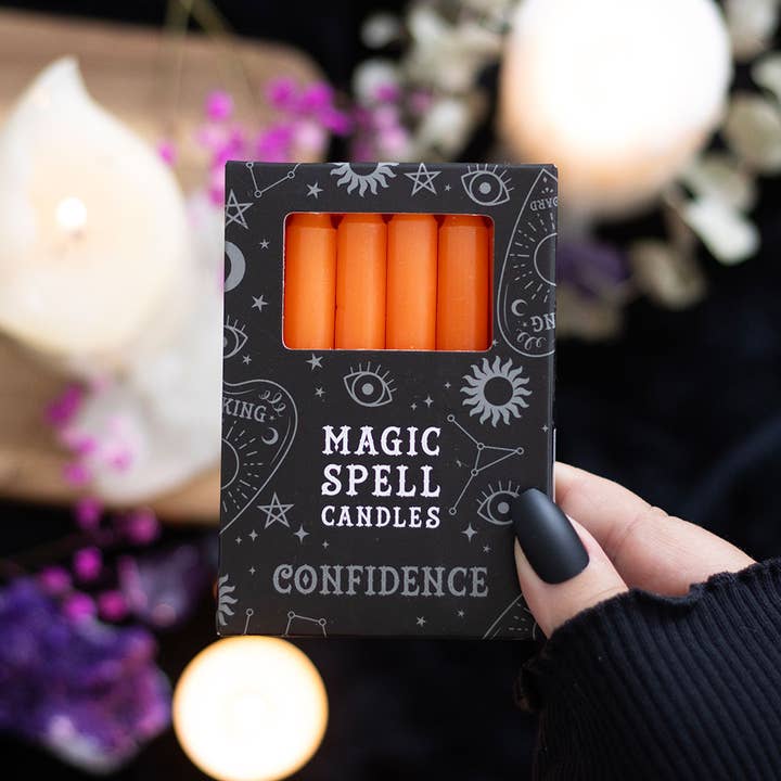 Set of 12 Orange 'Confidence' Magic Spell Candles for wholesale by Something Different Wholesale