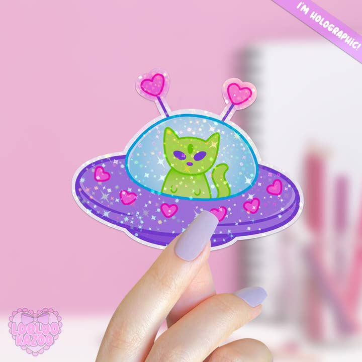 Holographic Stars UFO Kawaii Alien Cat Vinyl Sticker for wholesale by LooLooKazoo