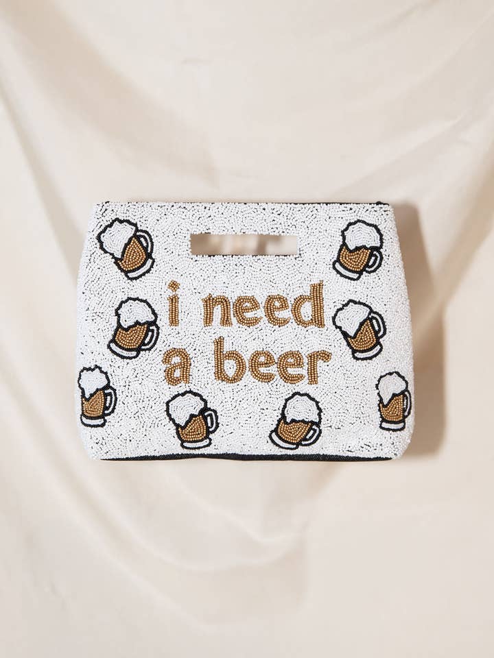 J'ai besoin d'une pochette à bière. pour la vente par Island to East Side