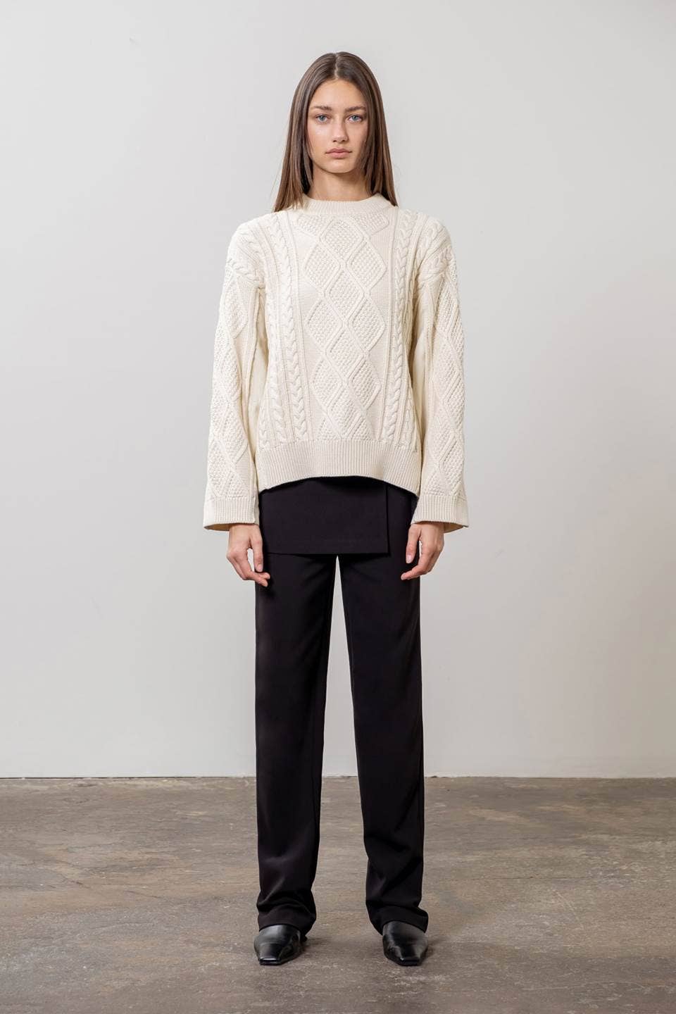 CREAM CABLE KNIT SWEATER WITH DENIM DETAIL for wholesale on Faire
