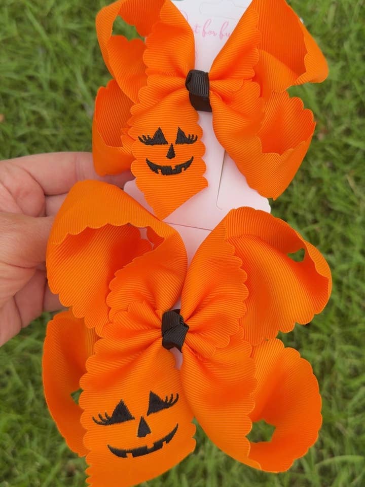 Sweet & Spooky Scallop Pumpkin Bows for wholesale by Just For Fun Threads