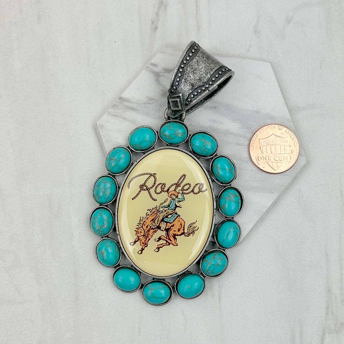 Western Elite Jewelry - Vendita all'ingrosso Ciondolo/pendente - PD231210SL-09 Ciondolo ovale da cowboy in metallo argentato con pietra turchese blu