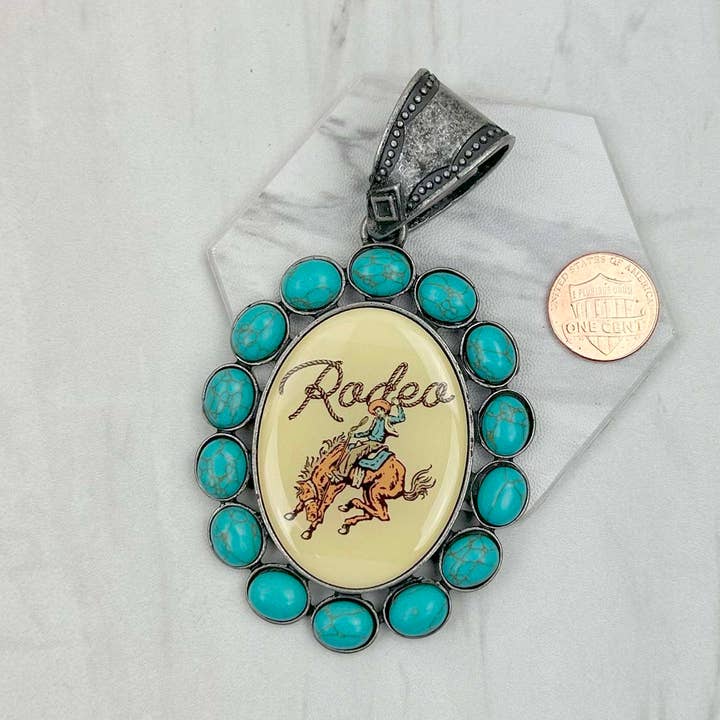 PD231210SL-09 silver metal with blue turquoise stone oval cowboy Pendent for wholesale by Western Elite Jewelry