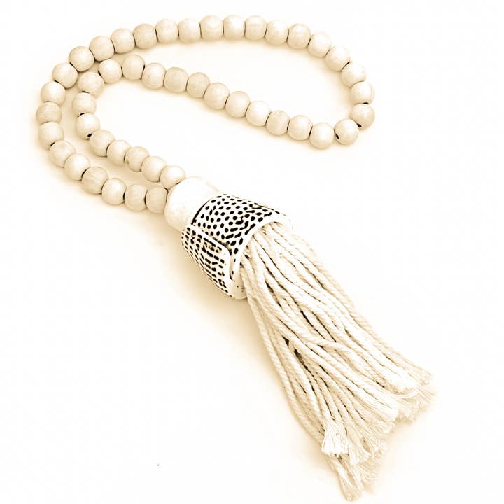 Wooden Beaded Tassel with Conus Leopardus shell and other Purchase Wholesale beaded curtains. Free Returns & Net 60 Terms on Faire trending on Faire.