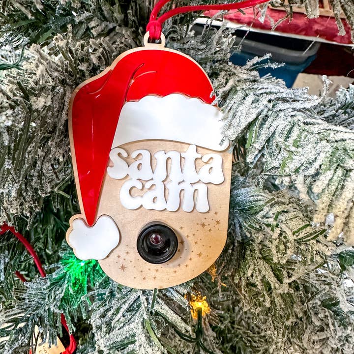 Santa Cam Ornament – Real Camera Lens | Acrylic & Wood Christmas Ornament | Red or Pink Santa Hat for wholesale by Grace & Moxie by Stacy