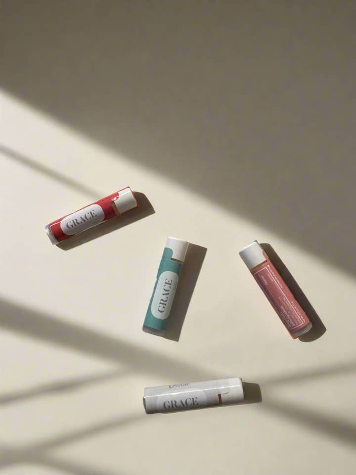 Conjuntos de Bálsamo Labial Vegano com SPF 15 Toque de Graça por atacado de Gracebynazzy®