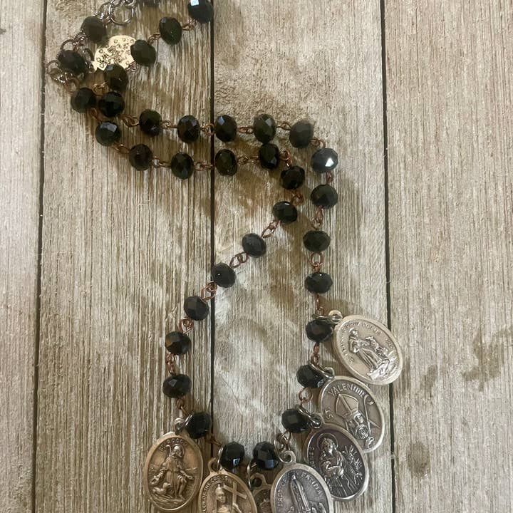 7 Religious Medals on Black Beads-spiritual/gift/bookshop for wholesale by Savannah Hoffman Designs Artisian Jewelry
