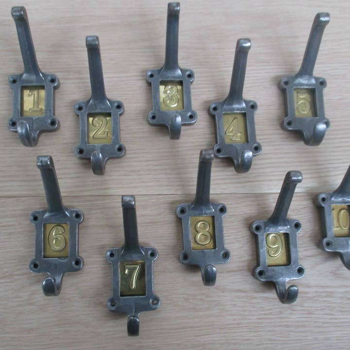 Brass Insert 1-10 Numbered Coat Hooks Antique Iron for wholesale by IronmongeryWorld