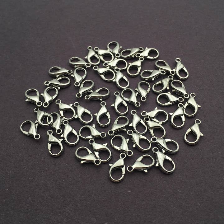 50 stuks zilver vergulde karabijnsluiting maat 8x14mm verkocht per zakje voor wholesale door CRCBEADS