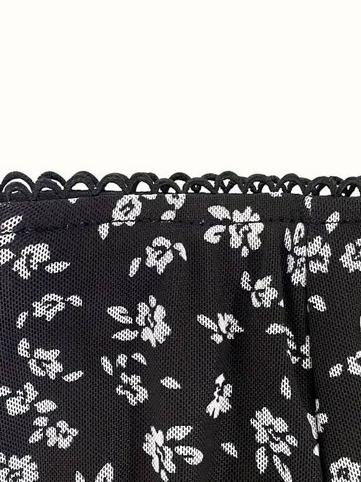 Black CWBMS0120_GAUZE FLORAL LONG HALF LIFE SKIRT for wholesale on Faire