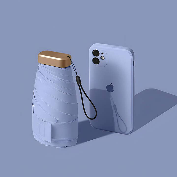 "Carte" Pocket Mini Umbrella - Lavender and other Purchase Wholesale out of the blue. Free Returns & Net 60 Terms on Faire trending on Faire.