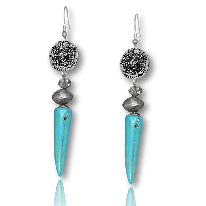 Boucles d'oreilles turquoises argentées avec amulette en forme de dent en magnésite pour la vente par Anísch de la Cara