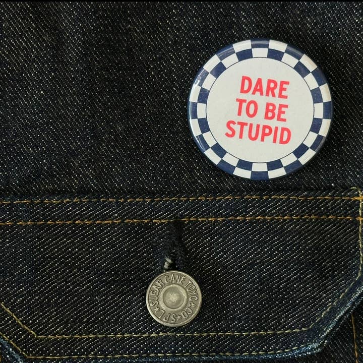 World Famous Original - Wholesale Lapel Pin/Button - Dare To Be Stupid Button1