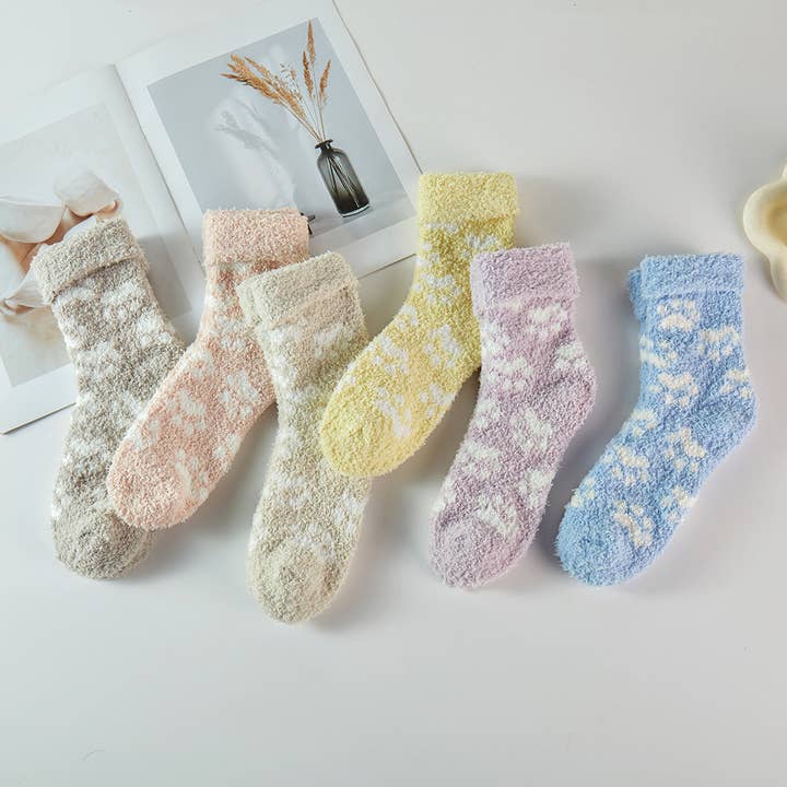 Cat Footprint Fuzzy Winter Socks and other Purchase Wholesale socks that save cats. Free Returns & Net 60 Terms on Faire trending on Faire.
