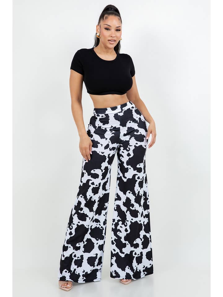 BLACK WHITE B11401 TECHNO CREPE COW PRINT PANTS WITH BACK METAL ZIPPER for wholesale on Faire5