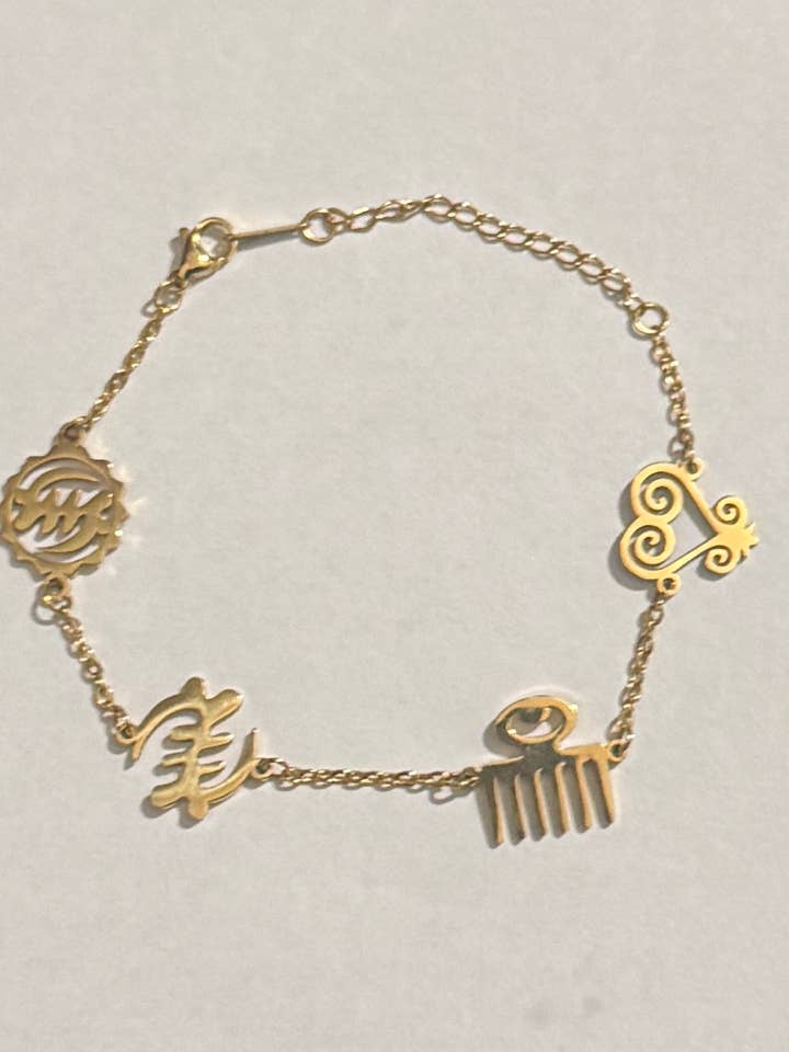 Bracelet avec symboles Adinkra mixtes pour la vente par The Curator