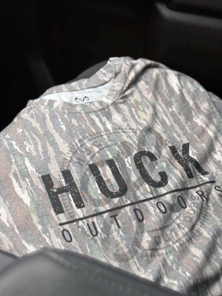 Huck Outdoors - Wholesale Screen Printed T-Shirt - Unisex - Ghost Logo - Realtree Original Camo