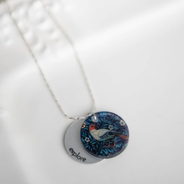 Blue Bird Eclipse Charm Necklace for wholesale by Giftologie
