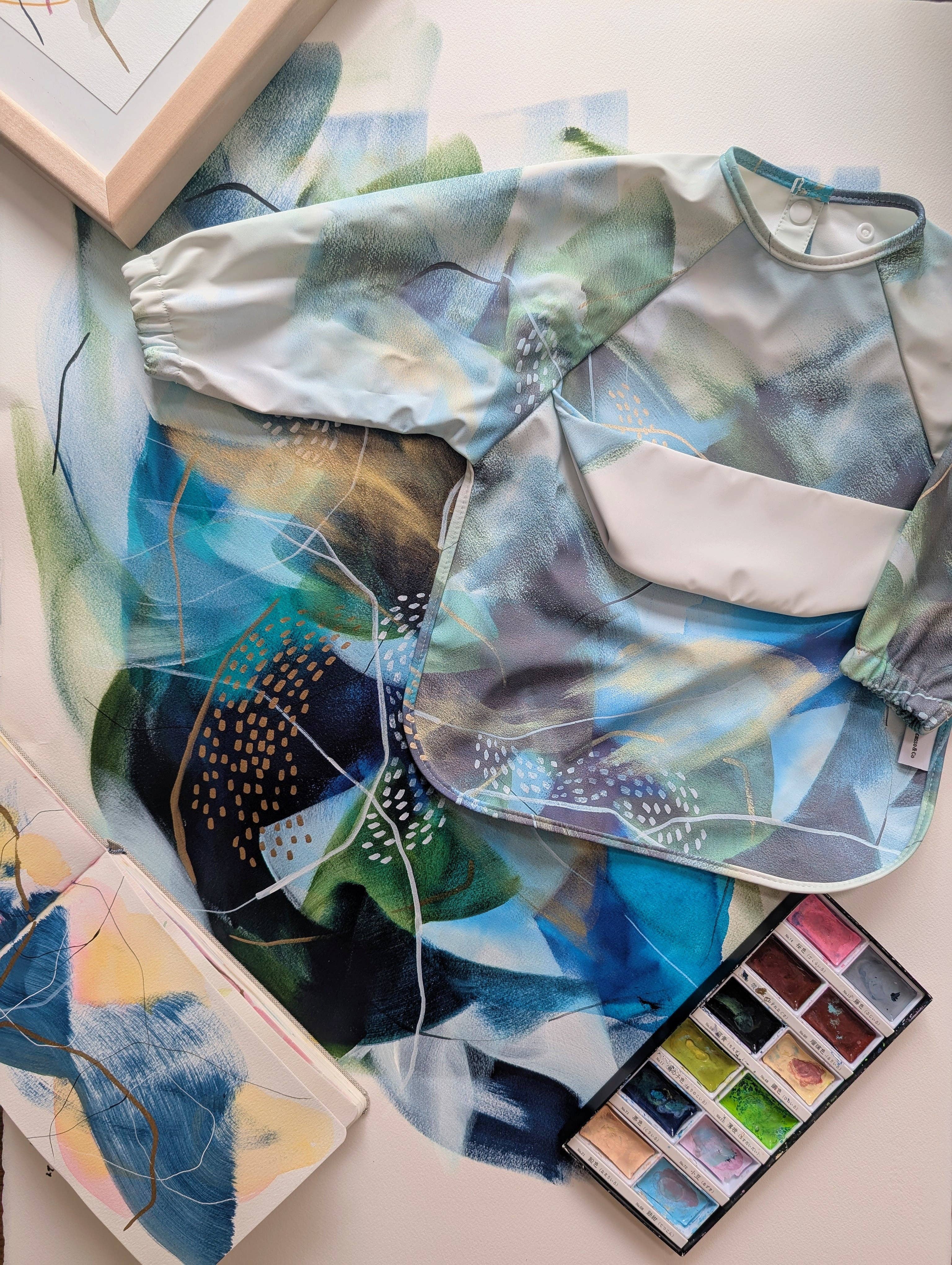 Micasso & Co - Wholesale Apron - Kids - Long-sleeve bib with integrated pocket2