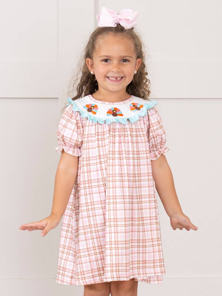 Turkey Trot Smocked Dress for wholesale by Marie Nicole Clothing