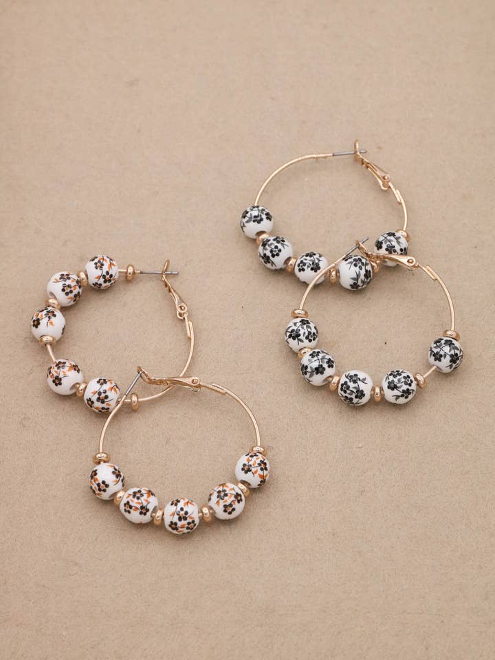 Gold Dipped Floral Print Ceramic Hoop Earrings for wholesale by Mint & Shine