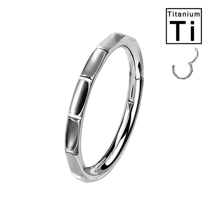 Titanium clicker circle with geometric design and recesses for wholesale by Awaken