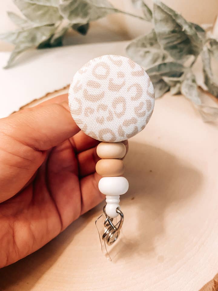Neutral Badge Reel with Nude Leopard Button Topper for wholesale by The Crafting Junkie Ga