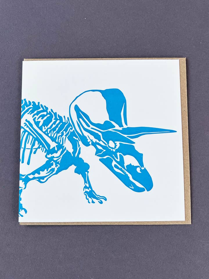 Triceratops Buchdruckkarte für den Großhandel von Penguin Ink