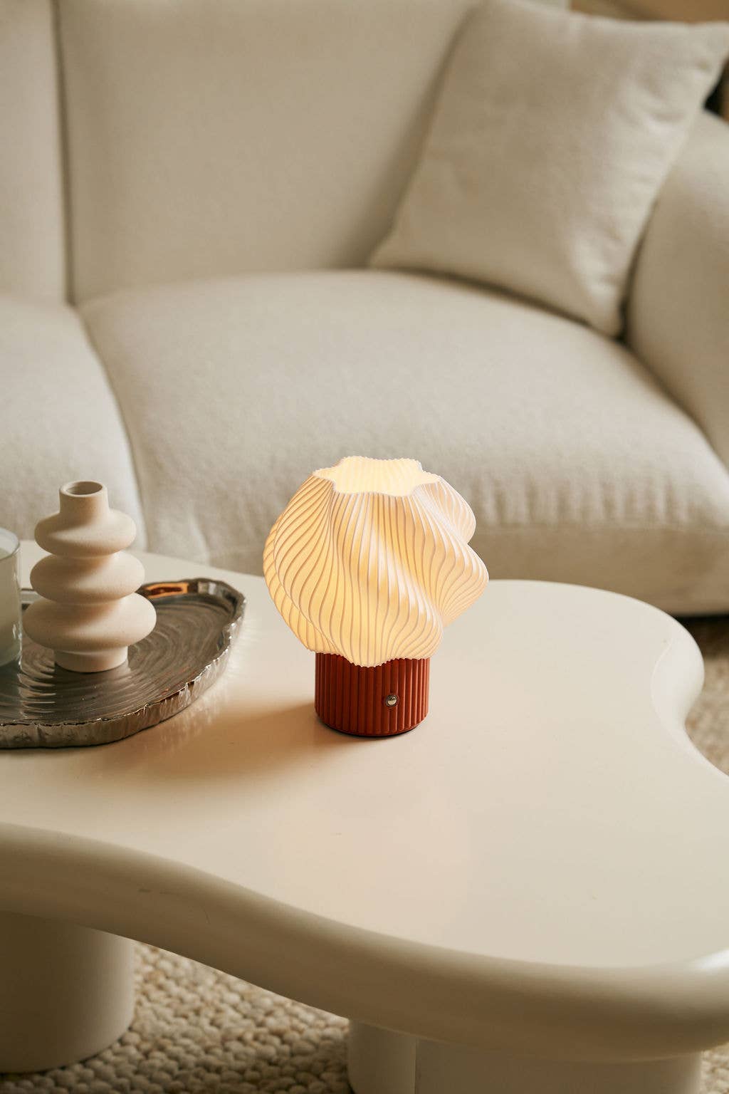 Colorless Mini Swirl Portable Lamp, Wireless and Rechargeable for wholesale on Faire