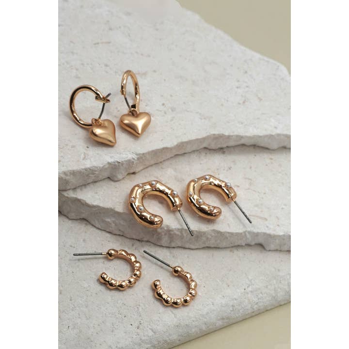 Gold HEART DROP PEARL STUDED HOOP TRIO EARRINGS | 80E6397 for wholesale on Faire1