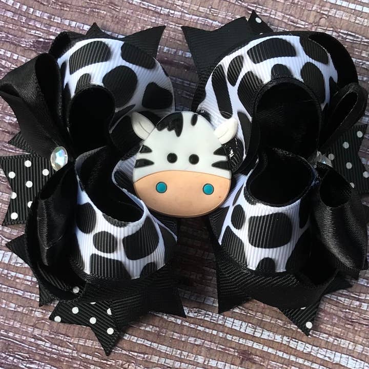 Handmade Girls Cow Print OTT Hair Bow for wholesale by Annabelles Designs