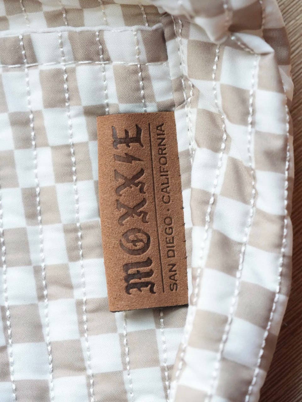 White and Tan Pet Sling Carrier- the "Luna" for wholesale on Faire3