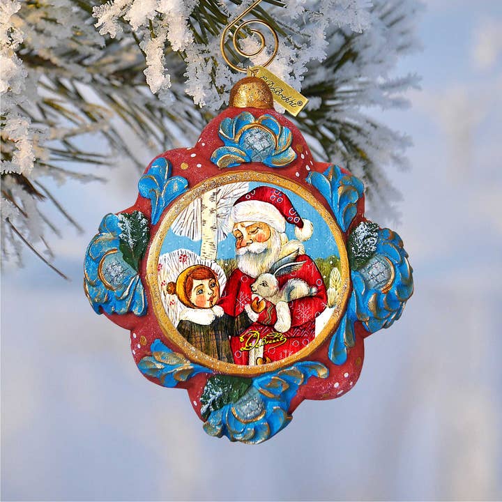 Ornement sculpté à la main Père Noël avec garçon G.debrekht pour la vente par Designocracy