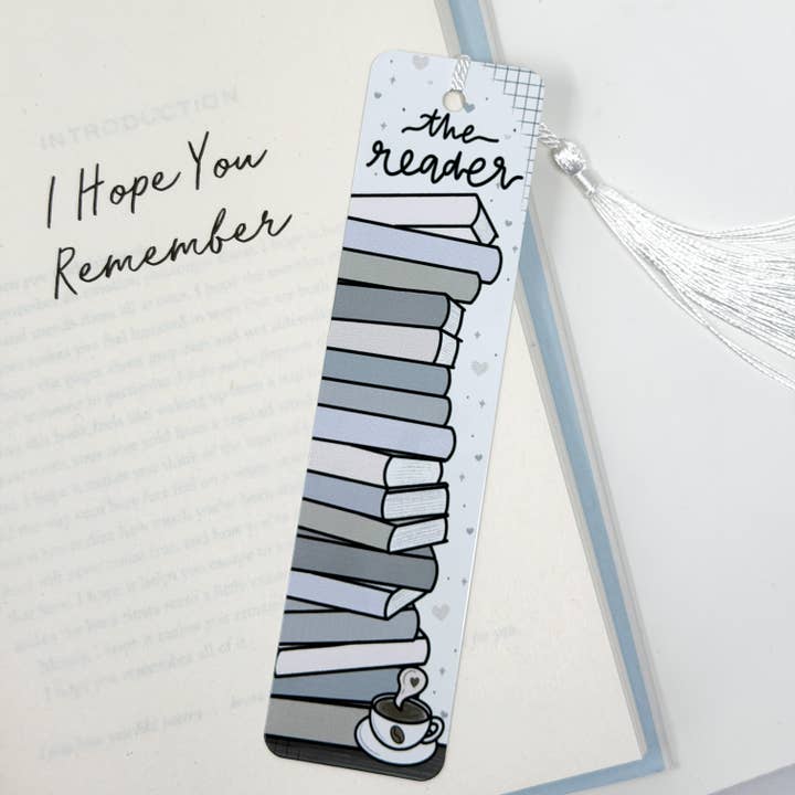 The Reader Metal Bookmark With White Tassel for wholesale by Plannermonkeyco
