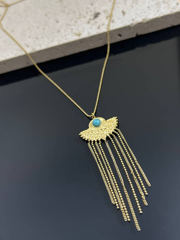 Collier pendentif long chaine et pierre turquoise en acier pour la vente par COSMOS