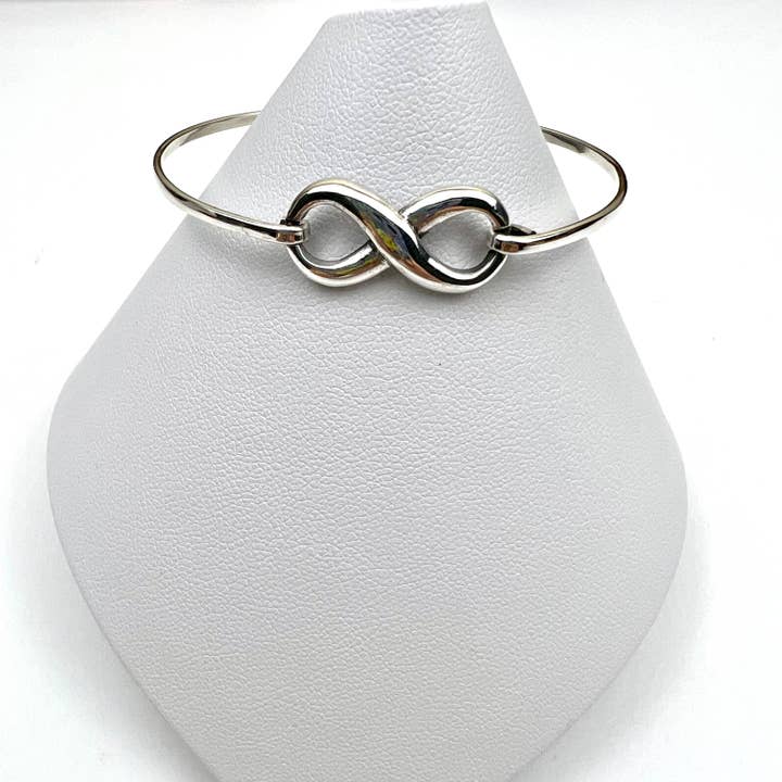 Sterling silver Infinity Bangle for wholesale by Jackie Gallagher Designs - Handmade Coastal Jewelry