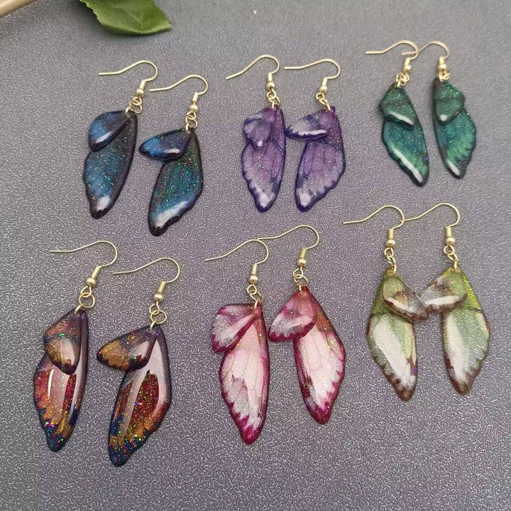 Colored Bright Butterfly Wing Dangle Earrings
for wholesale by Mio Queena
