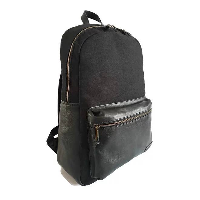 Handcrafted Classic Full-Grain Leather & Organic Canvas Backpack for wholesale by Presence