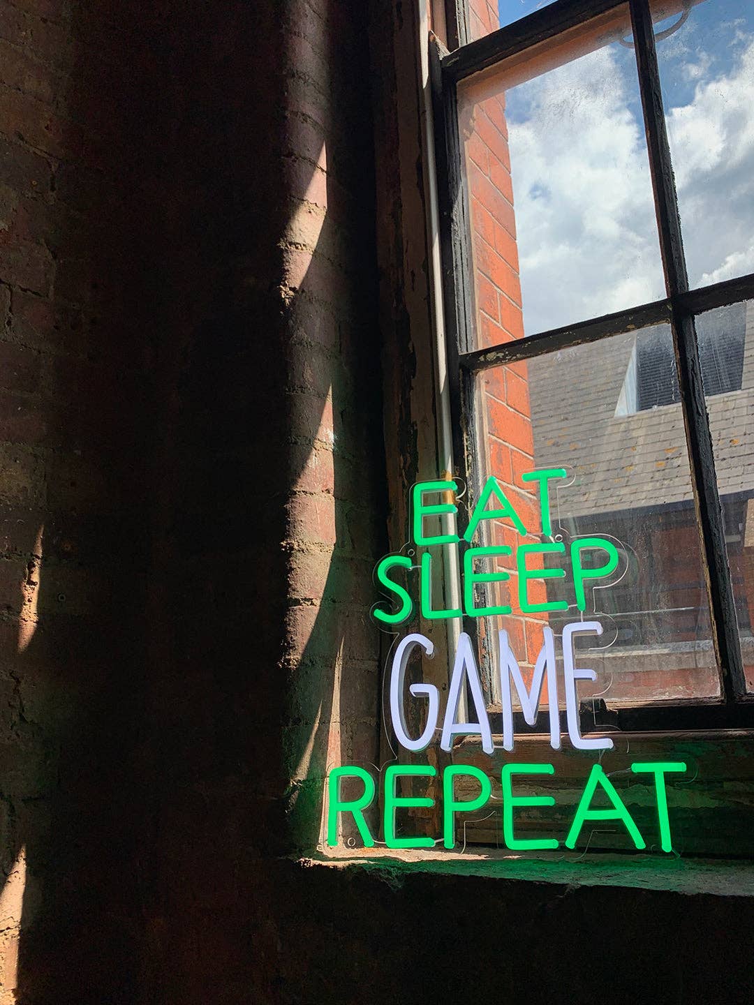 Eat Sleep Game Repeat' Green & White Neon LED Wall  Sign for wholesale on Faire5