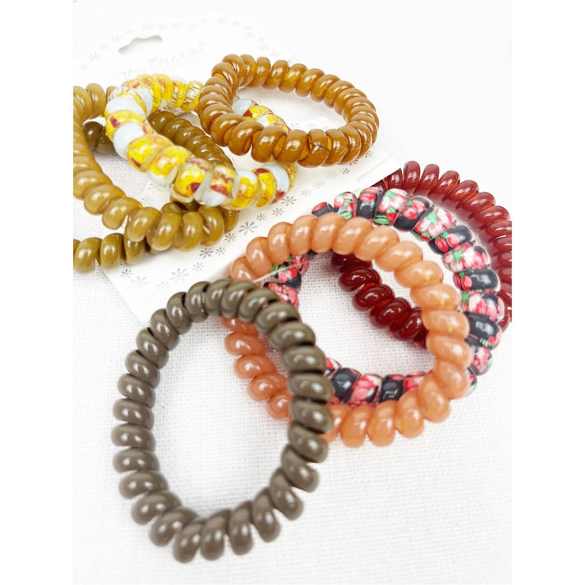 Print and Solid Mix Multi Design Spiral Hair Ties for wholesale on Faire1