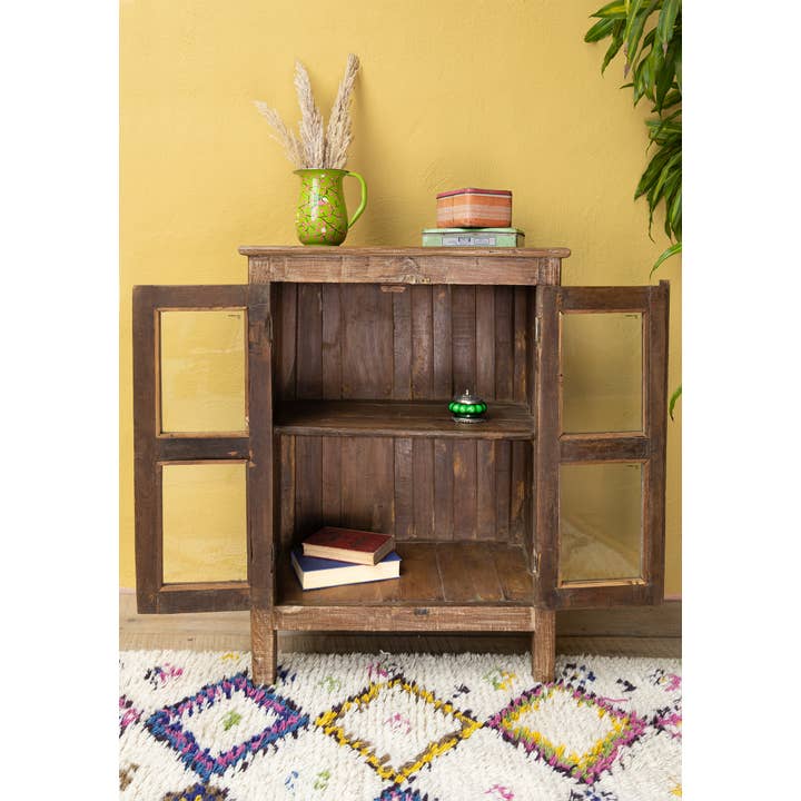 Namaste – wholesale Cabinet – Distressed Wood & Glazed Door Cabinet With Central Shelf