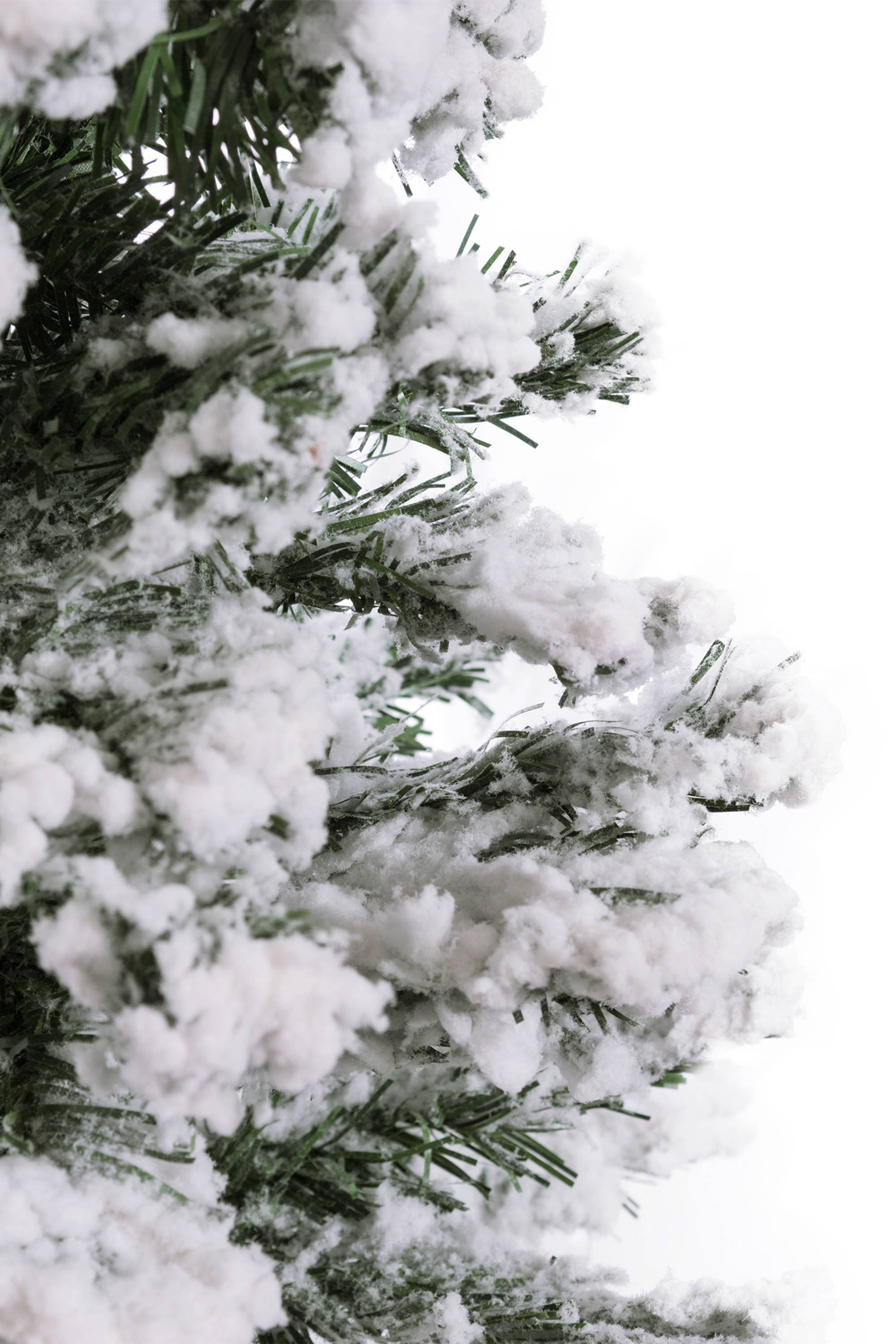 Green 2' Snow Flocked Tabletop Christmas Tree for wholesale on Faire2