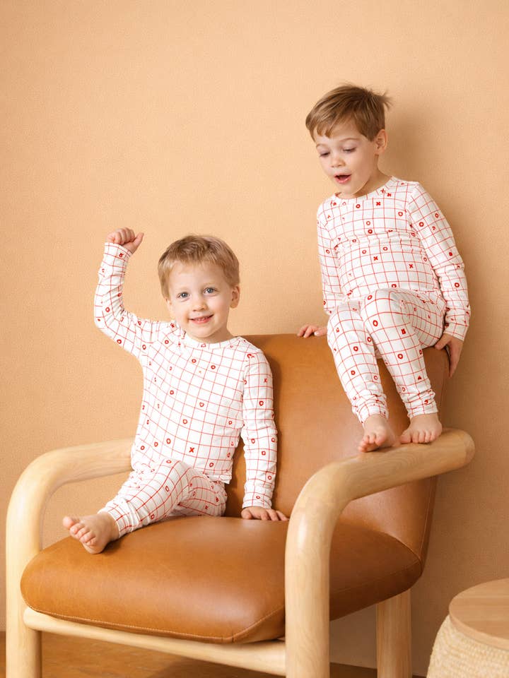 XOXO Checkerboard Two Piece Pajamas for wholesale by Nomad Baby