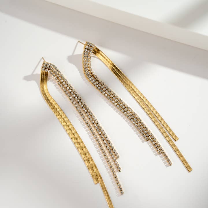 Long rhinestone drop earrings for women in stainless steel and other Purchase Wholesale rhinestone chain. Free Returns & Net 60 Terms on Faire trending on Faire.